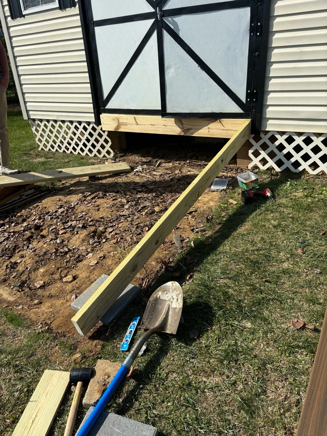 Wood framing in progress for an outbuilding ramp